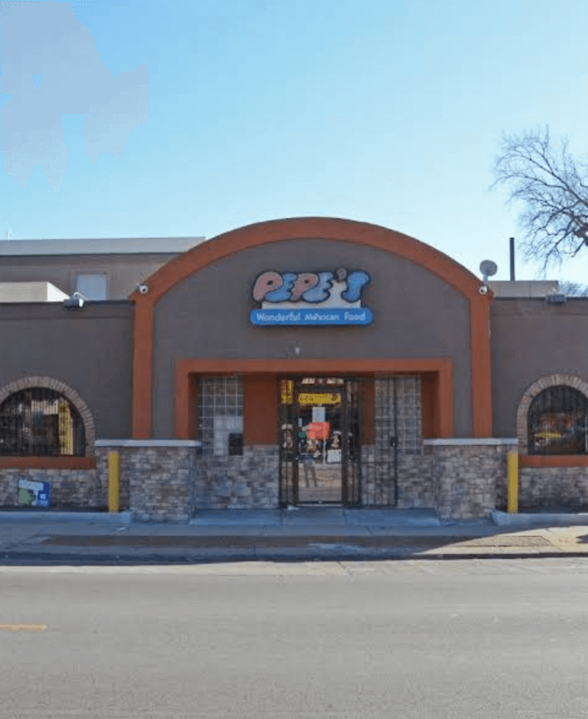 Exterior view of Pepe’s Mexican Restaurant with arched entrance, brick details, and colorful logo sign above the door.
