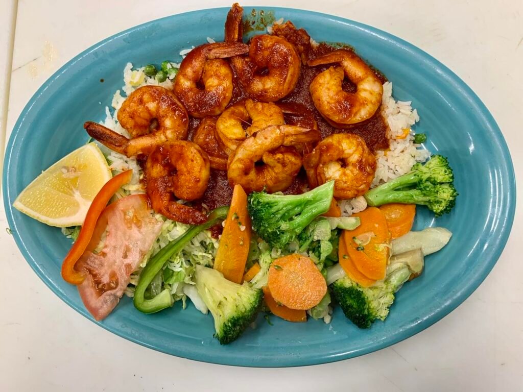 Authentic Mexican dish with rice, beans, and fresh ingredients served at Pepe’s Mexican Restaurant in Chicago.