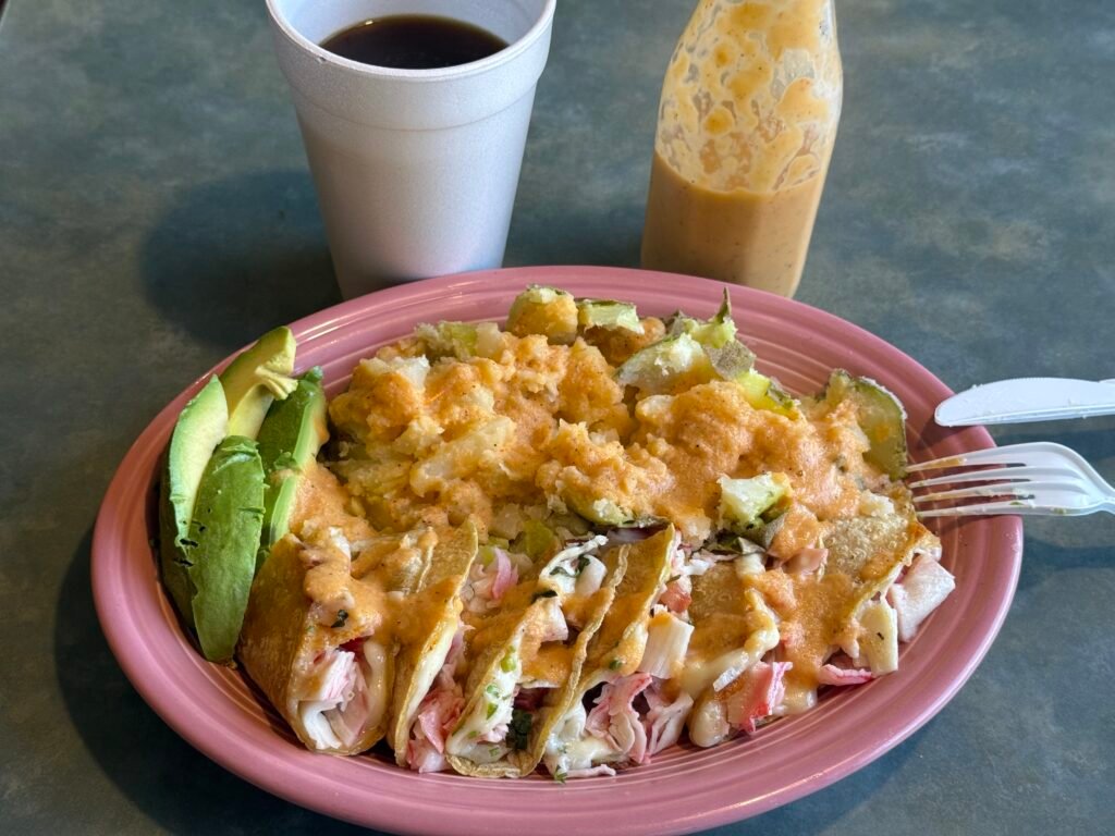 crab meat imitation quesadillas with backe potatoes topped with homemade abanero sauce.