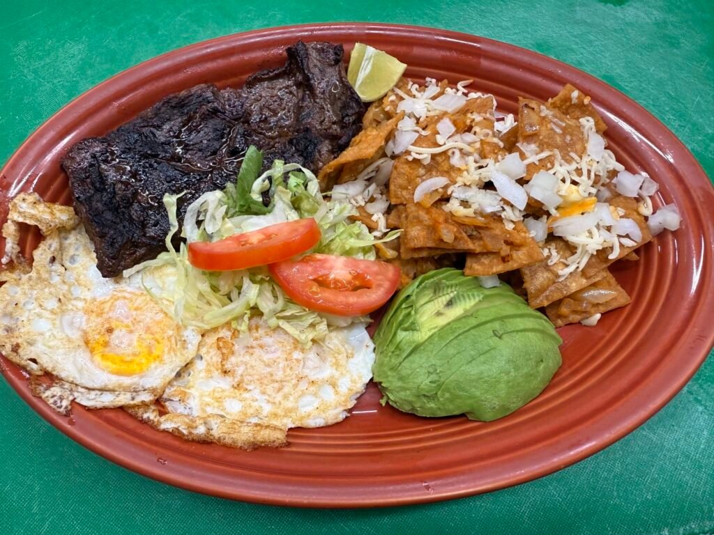 steak and eggs with chile de arbol chilaqu